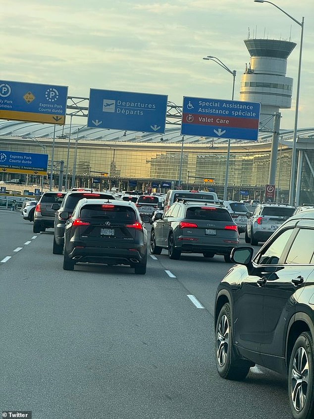 Images on social media show cars backed up along the onramp to the departure area, with dozens of cop cars surrounding the airport