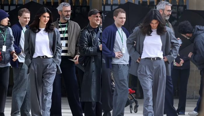 Kendall Jenner turns heads in sleek grey suit on Paris set