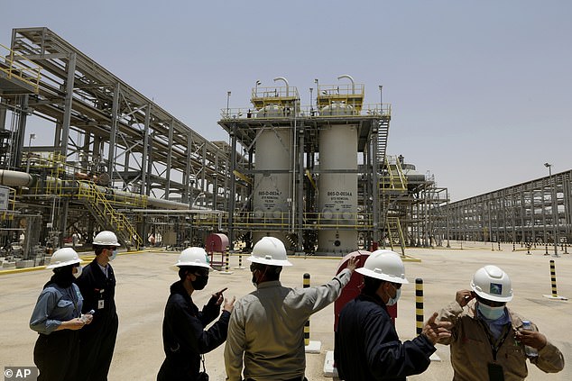 Saudi Aramco engineers at the Hawiyah Natural Gas Liquids Recovery Plant in Hawiyah, in the Eastern Province of Saudi Arabia, June 28, 2021