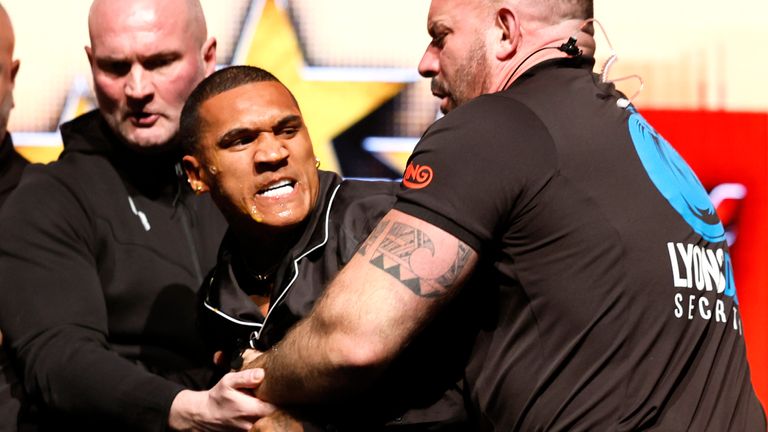 Conor Benn being held back by security after being struck with an egg by Chris Eubank Jr. Pic: PA