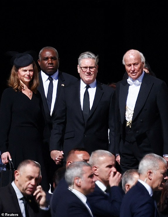 Britain's Prime Minister Keir Starmer and his wife Victoria Starmer arrive ahead of the funeral Mass of Pope Francis in St. Peter's Square at the Vatican, April 26, 2025. REUTERS/Guglielmo Mangiapane