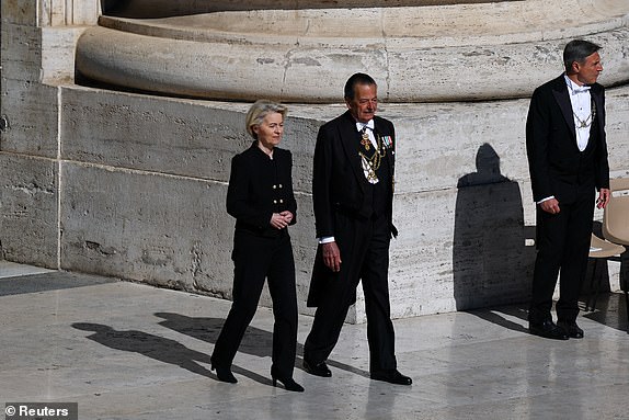 European Commission President Ursula von der Leyen walks ahead of the funeral Mass of Pope Francis, at the Vatican, April 26, 2025. REUTERS/Kai Pfaffenbach
