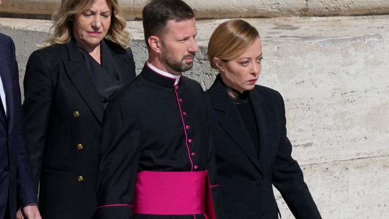 Prime Minister Giorgia Meloni, (right), arrives for the funeral. Pic: AP