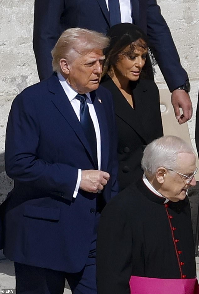 She added an elegant black lace veil as well as matching gloves, and wore a simple diamond-studded cross pendant, in keeping with the strict dress code for the event