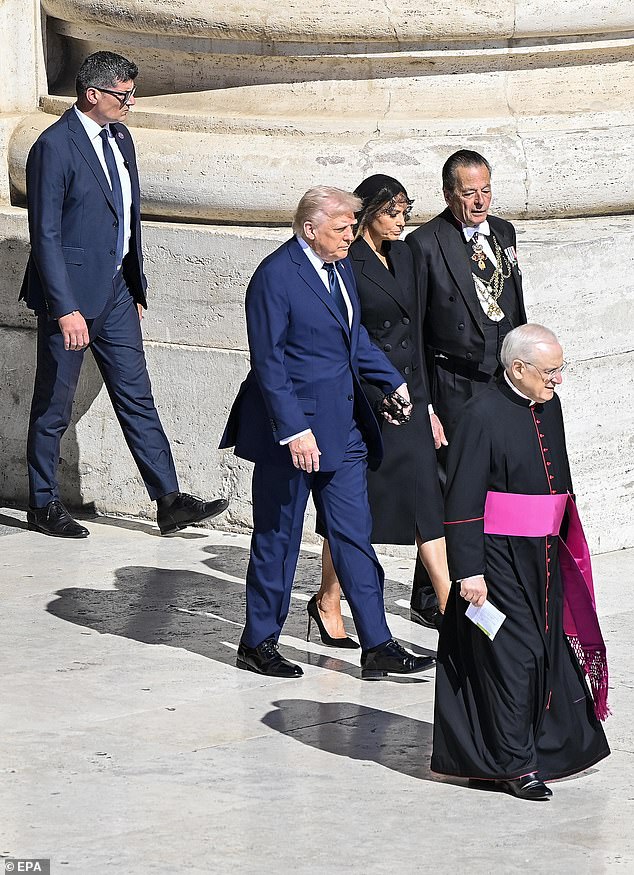 Adhering to the Vatican's strict dress code for the funeral, Melania opted to wear a black blazer and modest, calf-length pencil skirt