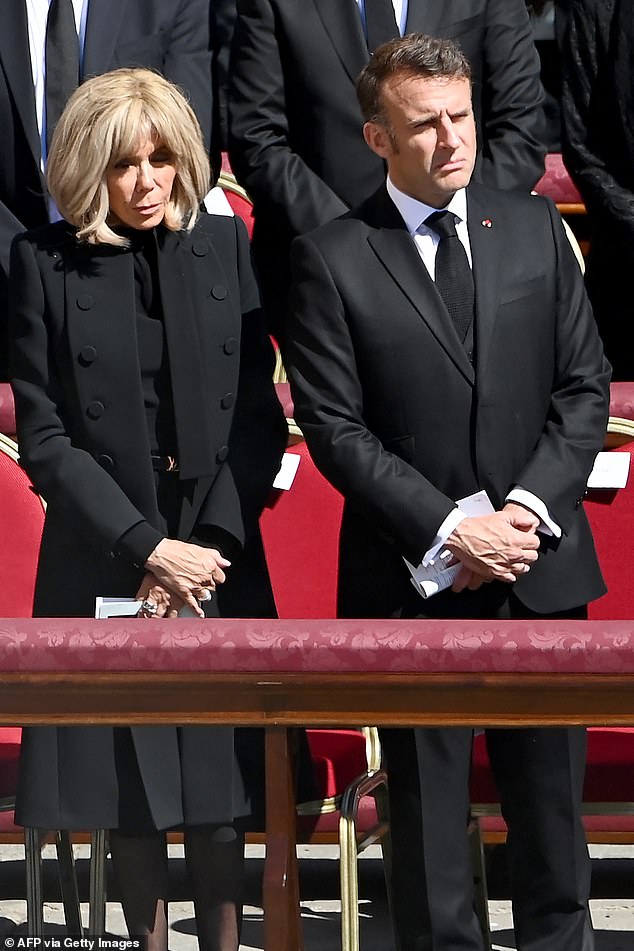 The wife of French president Emmanuel Macron, Brigitte Macron picked a black turtleneck that she tucked into a long, pleated skirt, paired with a cropped jacket