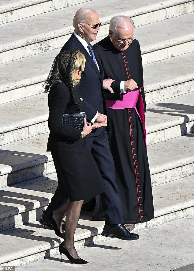 Biden wore a dark suit to the funeral, but also opted for a blue tie a he attended the solemn event