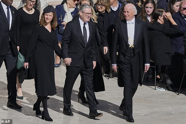 Traditionally, smart, dark outfits are worn out of a sign of respect - a practice adopted by many of the gathered mourners, inluding Sir Keir Starmer