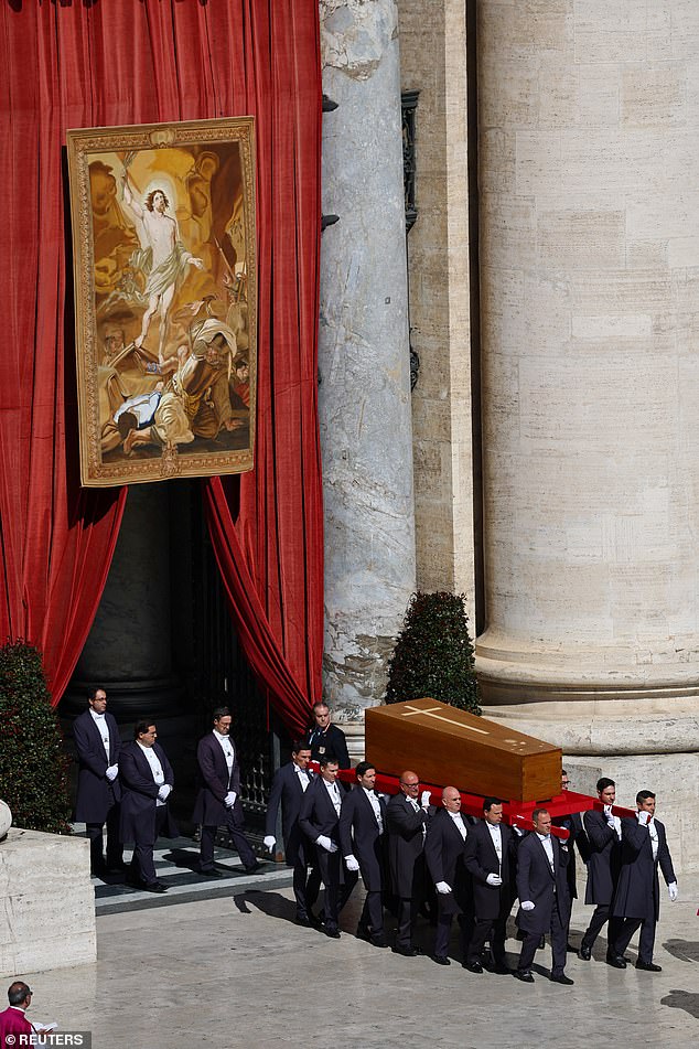 The coffin of Pope Francis is carried out of St Paul's Basilica and into the square during the funeral Mass