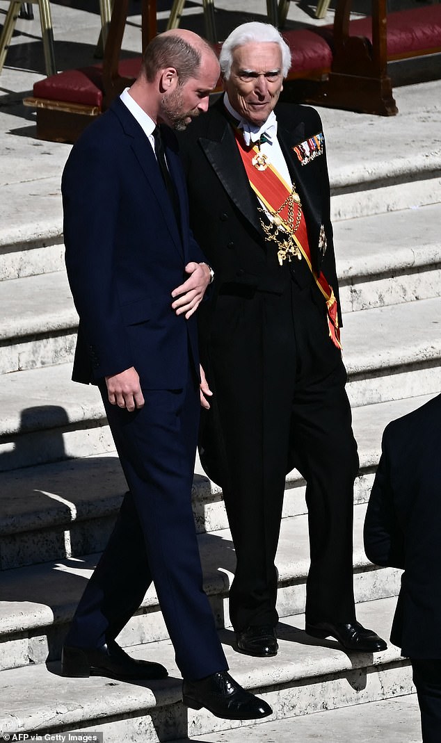 Britain's Prince William (L) arrives ahead of the late Pope Francis' funeral ceremony on April 26