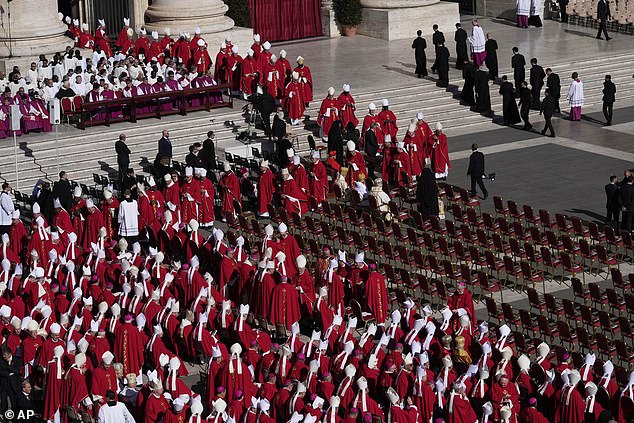 Cardinals take their seats for the funeral of Pope Francis in St. Peter's Square at the Vatican