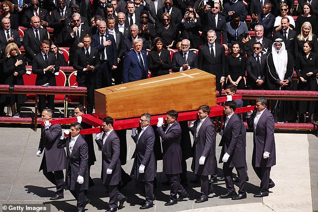 Pictures were taken of the Pope Francis's coffin as it was taken away by bearers at basilica