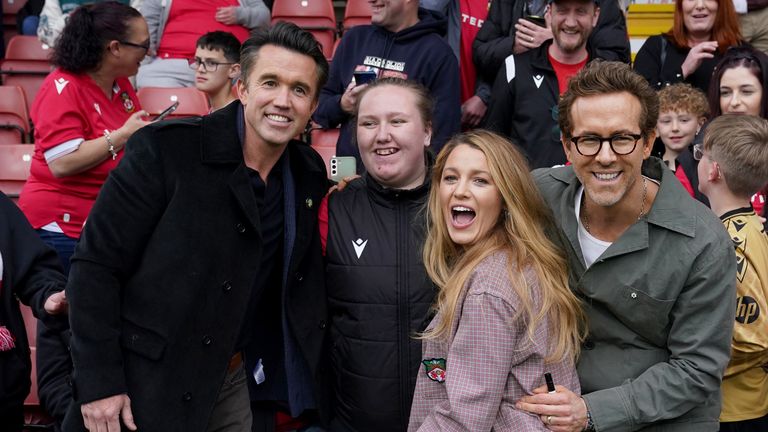 Wrexham co-owners Rob McElhenney (left) and Ryan Reynolds (right) and Ryan's wife Blake Lively before the Sky Bet League One match at SToK Racecourse, Wrexham. Picture date: Saturday April 26, 2025.

