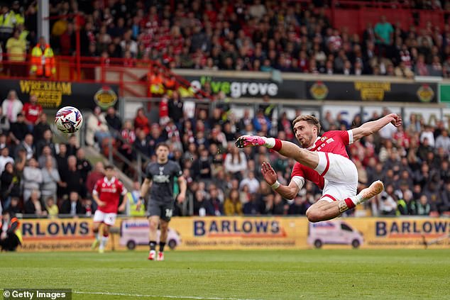 Sam Smith scored a superb second as Wrexham beat Charlton 3-0 to a Championship berth