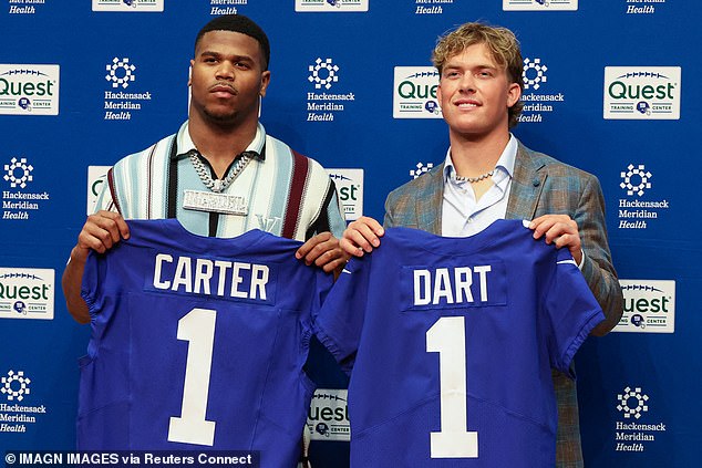 New York Giants first-round draft picks, Abdul Carter and Jaxson Dart, pose for local media