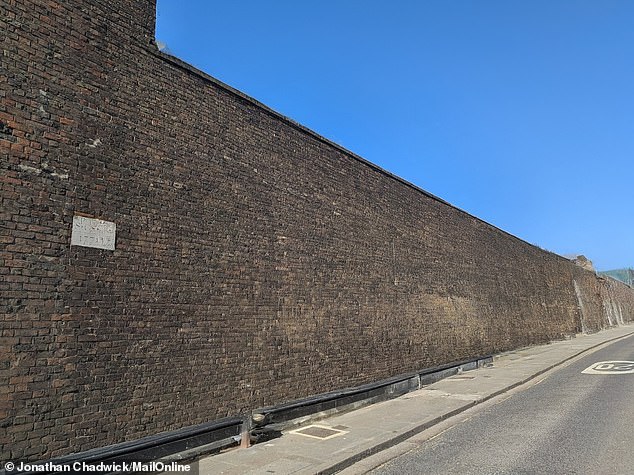 With a few taps of the screen I can make all the buildings disappear replaced with wall, using data from the left-hand side of the original image