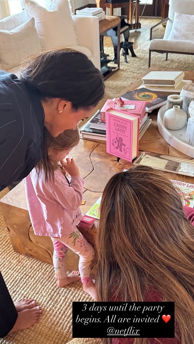 An Instagram post Meghan shared ahead of the launch of her lifestyle programme featured a glimpse of three-year-old Lilibet (pictured, centre)