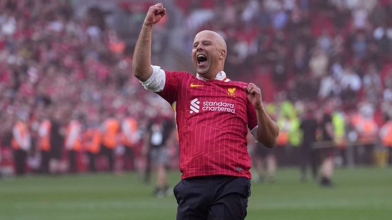 Slot cheers after the full-time whistle. Pic: AP