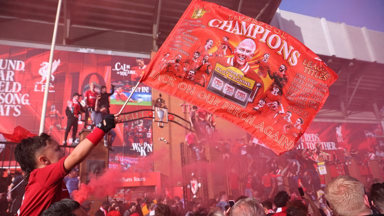 Liverpool's Kostas Tsimikas poses with a Premier League trophy cut out. Pic: Reuters