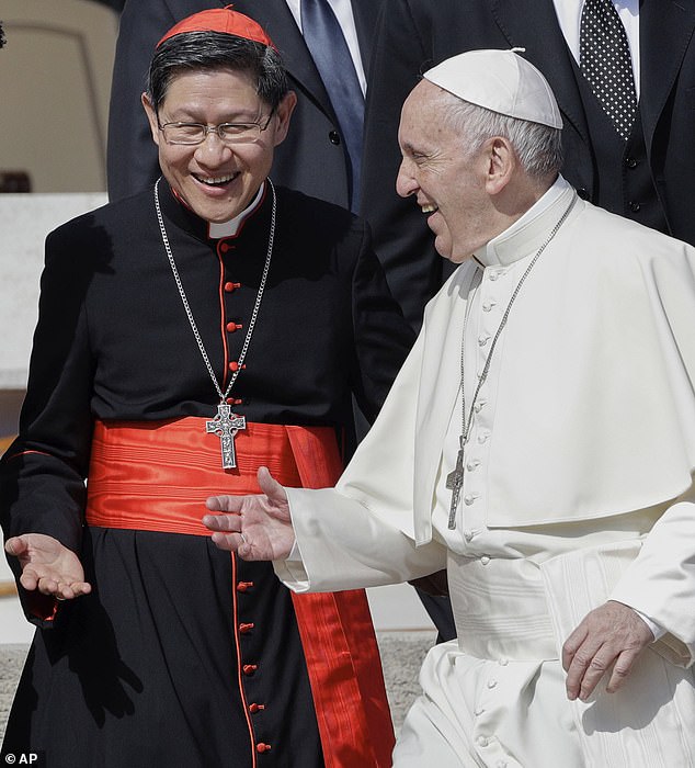 Cardinal Tagle (left) worked closely with Pope Francis (right) and shared many of his liberal views. Tagle has even been dubbed the 'Asian Francis'