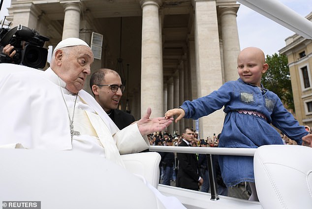 Pope Francis greeted a little girl during the Easter Mass in St. Peter's Square Sunday, a day before his death was announced by the Vatican