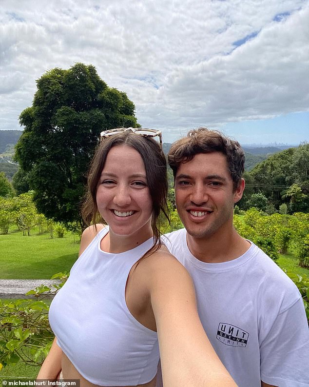 Police have appealed for help from witnesses to the crash that cost the Queensland-born racer (pictured with his fiancee) his life