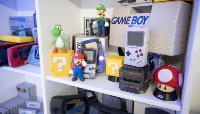 Retro video games and consoles displayed at the headquarters of RetroSix. — AFP/File