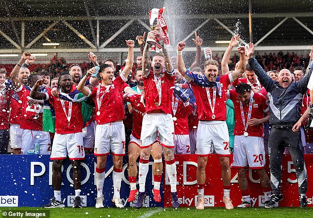 Wrexham secured their third consecutive promotion with a comfortable 3-0 win over Charlton
