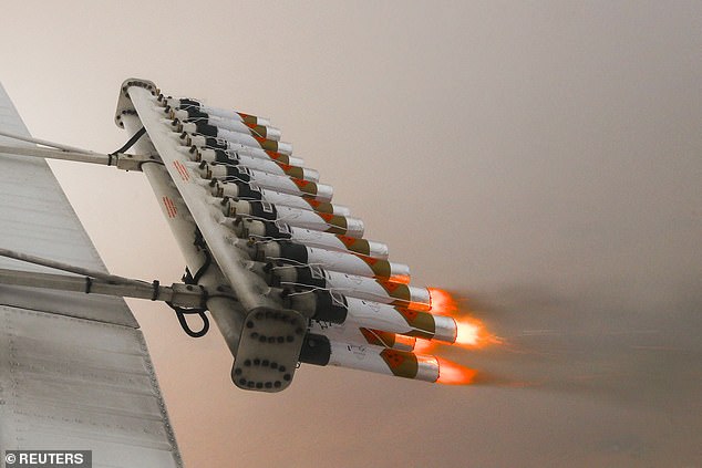 Modified aircraft are already used to release aerosols into the atmosphere for cloud seeding to increase rainfall (pictured). Large, similarly modified planes could soon be used for cooling the planet