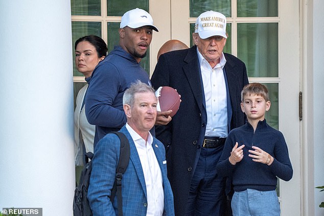 Barkley was pictured stood next to Trump after arriving at the White House on Sunday