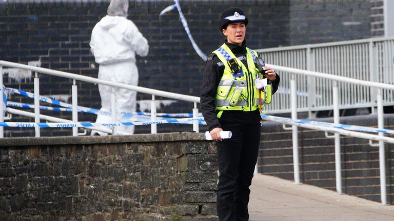 Police and Forensic investigators at Amman Valley school, in Ammanford, Carmarthenshire.
Pic: PA