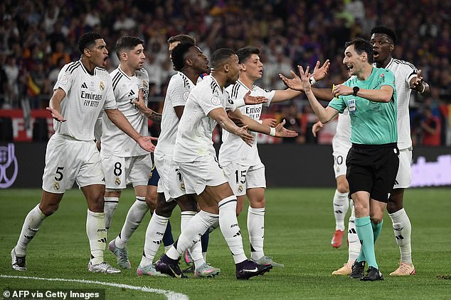 Real Madrid's players acted furiously towards the referee as they succumbed to a 3-2 loss