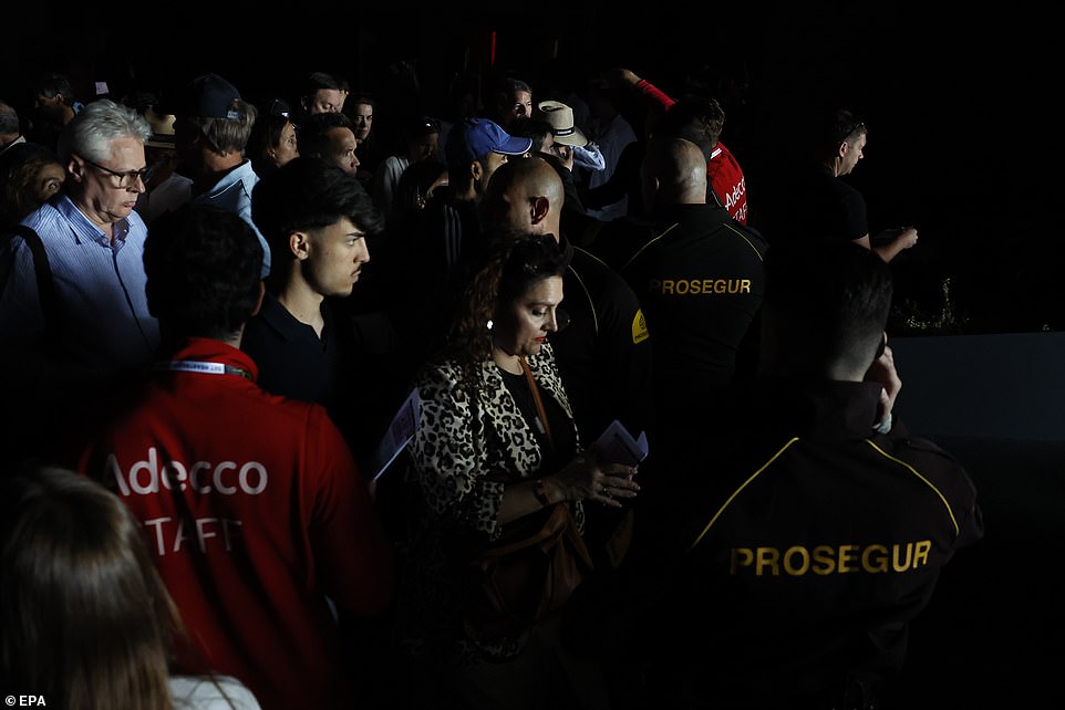 Several attendants leave Caja Magica tennis complex amid Mutua Madrid Open tennis tournament after a blackout