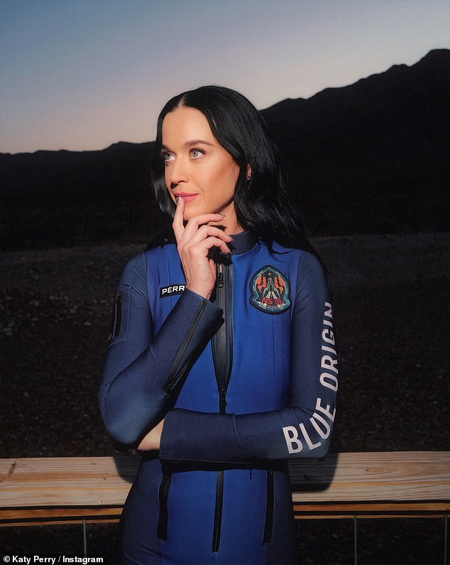 Katy Perry looked ready for action on Sunday as she posed alongside Lauren Sánchez in their blue space outfits ahead of their Blue Origin space mission on Monday