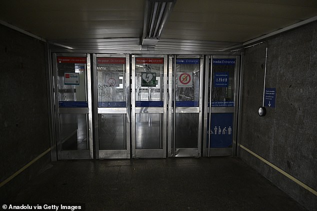 Closed doors at a Metro station in Madrid after the power outage hit