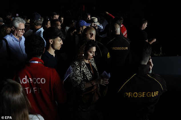 Several attendants leave Caja Magica tennis complex amid Mutua Madrid Open tennis tournament after a blackout