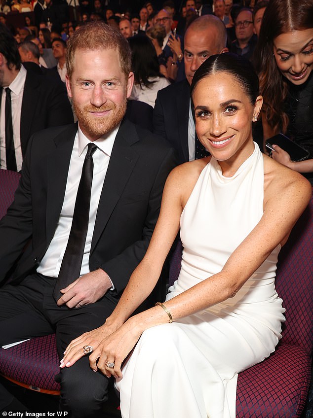 Gushing over her husband Prince Harry in a new interview, Meghan said: 'H, that man loves me so much and you know, look what we've built. We built a beautiful life and we have two healthy, beautiful children'