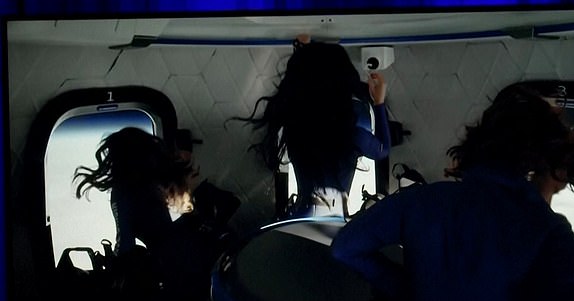 This handout photo from Blue Origin shows US singer Katy Perry upon return to Earth after a flight on Blue Origin New Shepard NS-31, which brought the passengers beyond the Karman line -- the internationally recognized boundary of space, in Van Horn, West Texas, April 14, 2025. Pop star Katy Perry completed a brief foray into space Monday, roaring to the edge of the cosmos with an all-women crew on one of billionaire Jeff Bezos's rockets. The "Firework" and "California Gurls" singer was lofted more than 60 miles (100 kilometers) above the Earth's surface in a vessel from Blue Origin, the space company owned by the Amazon founder. Five other women -- including Bezos's fiancee Lauren Sanchez -- were on the flight, which took off from western Texas shortly after 8:30 am (1330 GMT) before safely landing again some (Photo by Handout / BLUE ORIGIN / AFP) / RESTRICTED TO EDITORIAL USE - MANDATORY CREDIT "AFP PHOTO / HANDOUT / BLUE ORIGIN " - NO MARKETING NO ADVERTISING CAMPAIGNS - DISTRIBUTE