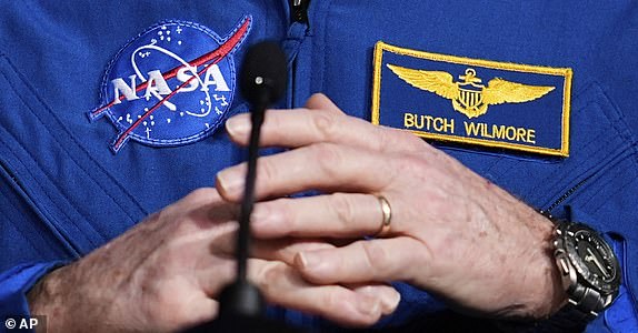 Astronaut Butch Wilmore talks to reporters during a press conference at Johnson Space Center on Monday, March 31, 2025, in Houston. (AP Photo/Ashley Landis)