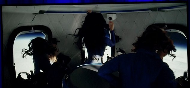 Footage from inside the capsule captured the crew's hair floating in weightlessness as they marveled at teh views of space