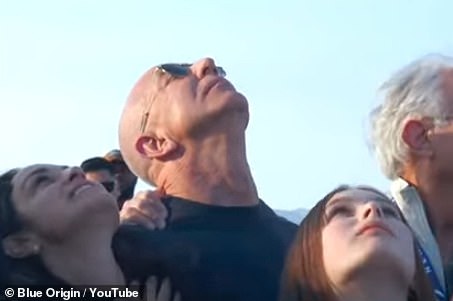 Blue Origin founder Jeff Bezos was seen watching the rocket carrying his fiancée into space Monday morning in West Texas