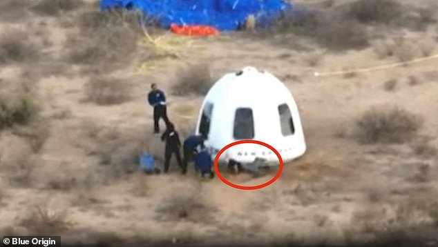 Blue Origin founder Jeff Bezos had a painful moment as he rushed to open the New Shepard capsule door Monday, tripping and falling face-first at the landing site