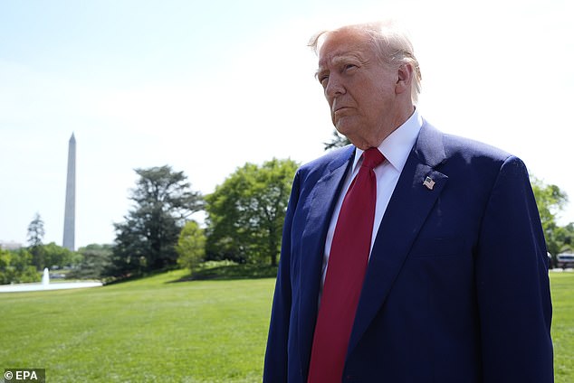 President Donald Trump speaks to the members of the media on the South Lawn of the White House before his departure to Michigan