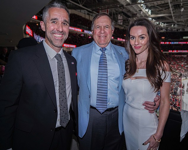 Bill Belichick and Jordon Hudson, pictured with Carolina Hurricanes president Doug Warf, took in some NHL playoff action on Tuesday night
