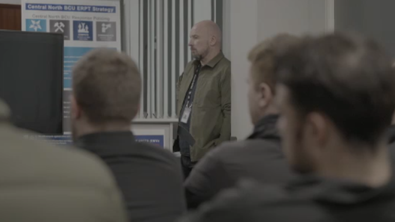 Derek Caroll, a specialist tactical firearms commander, during a briefing ahead of a dawn raid