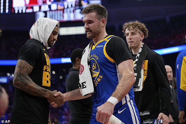 Spencer was applauded by his teammates as he left the court following his ejection
