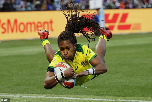 Green is pictured scoring for Australia in the Women's Rugby Sevens World Cup final in 2018
