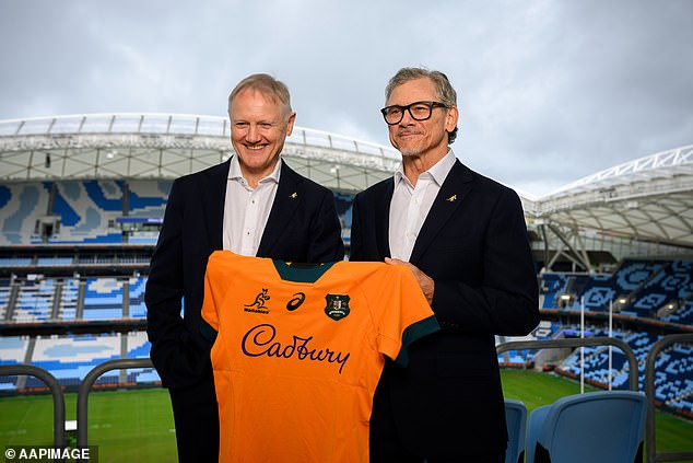 Wallabies coach Joe Schmidt (left) poses with the man who will replace him next year, former rugby league State of Origin star Les Kiss