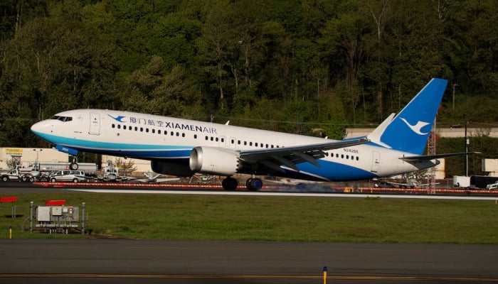 A Boeing 737 MAX 8 lands at Boeing Field in Seattle, Washington, US, on April 22, 2025. —Reuters
