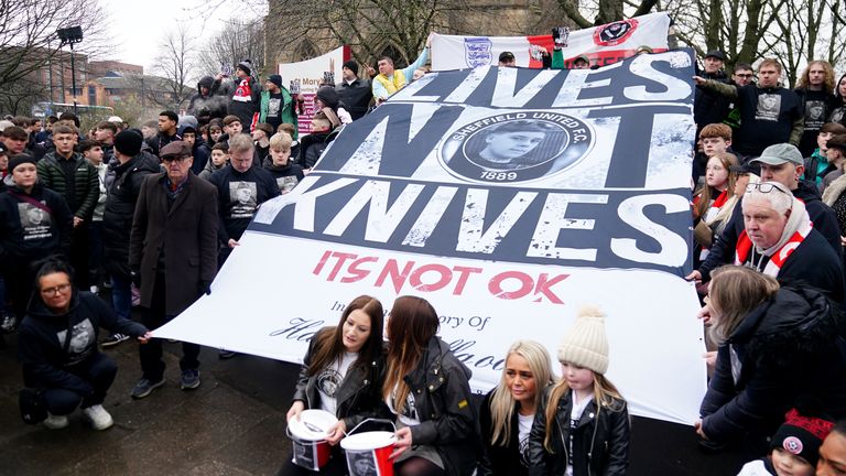 People march in memory of Harvey Willgoose. Pic: PA
